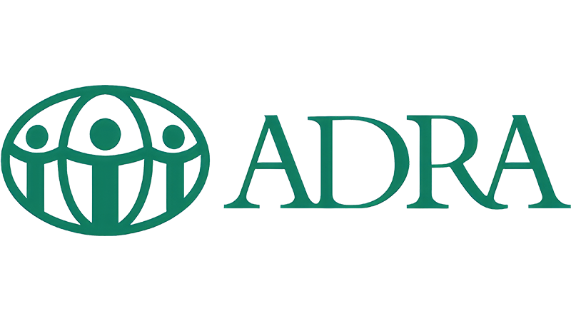 The ADRA logo features a green emblem with three stylized human figures enclosed in a globe-like design, symbolizing global unity and humanitarian outreach. To the right, the acronym “ADRA” appears in bold green capital letters.